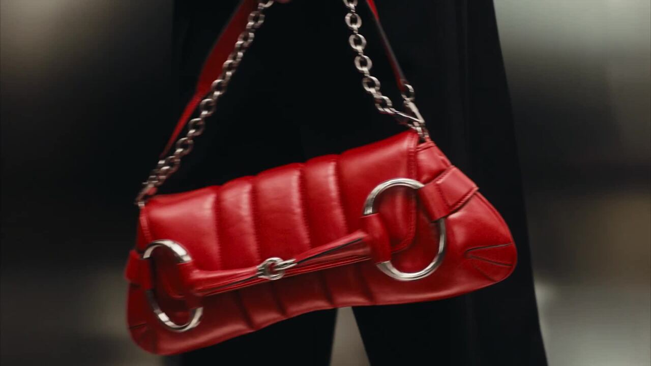 vittoria for the Gucci AW23 campaign in the interlocking G chain