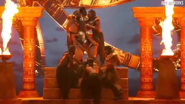Lil Nas X kisses male dancer in fiery BET Awards performance