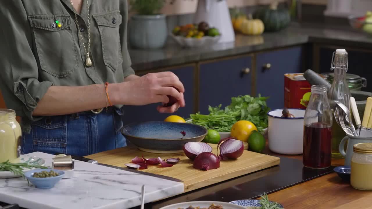 Herb oil, spiced nuts, pink pickled onion and salad dressing