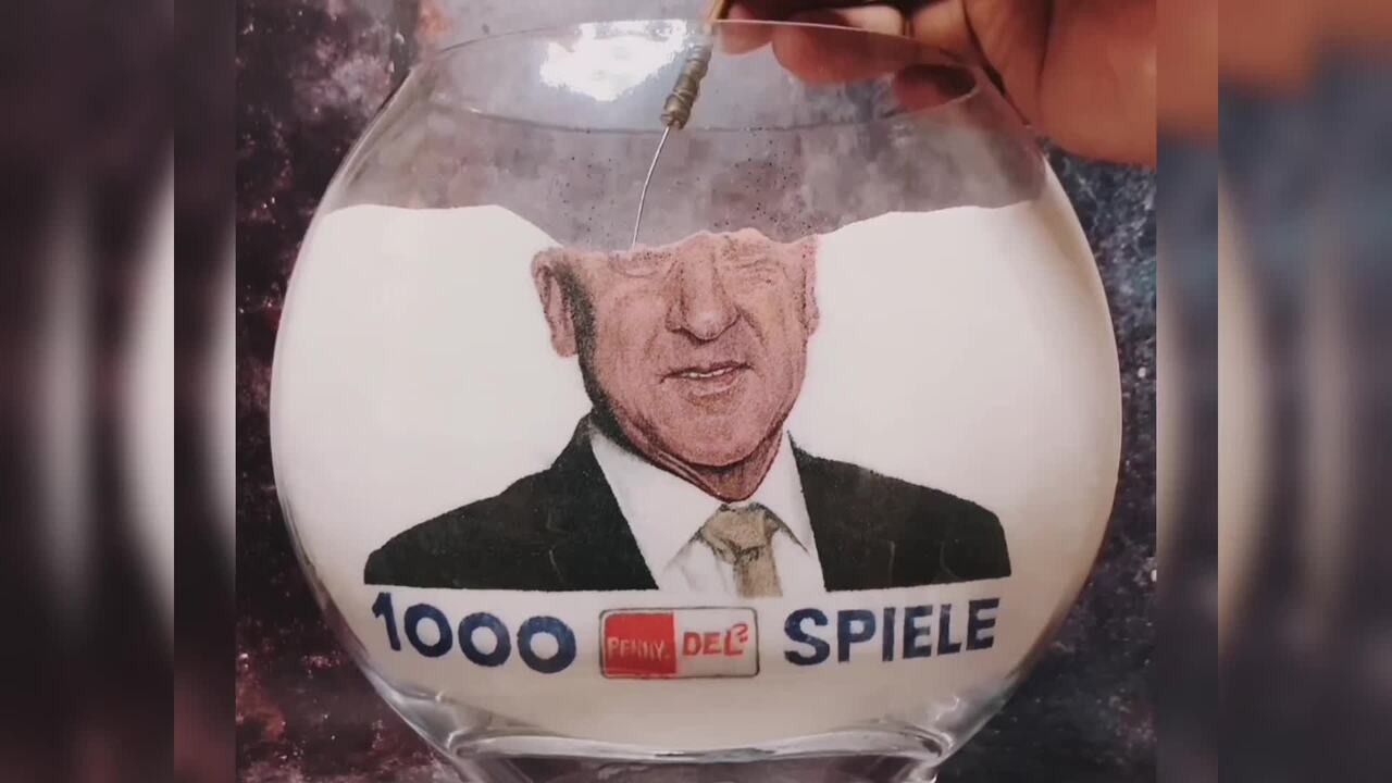 Kunstwerk aus Sand für Don Jackson zum 1000. Spiel als Coach in der PENNY DEL