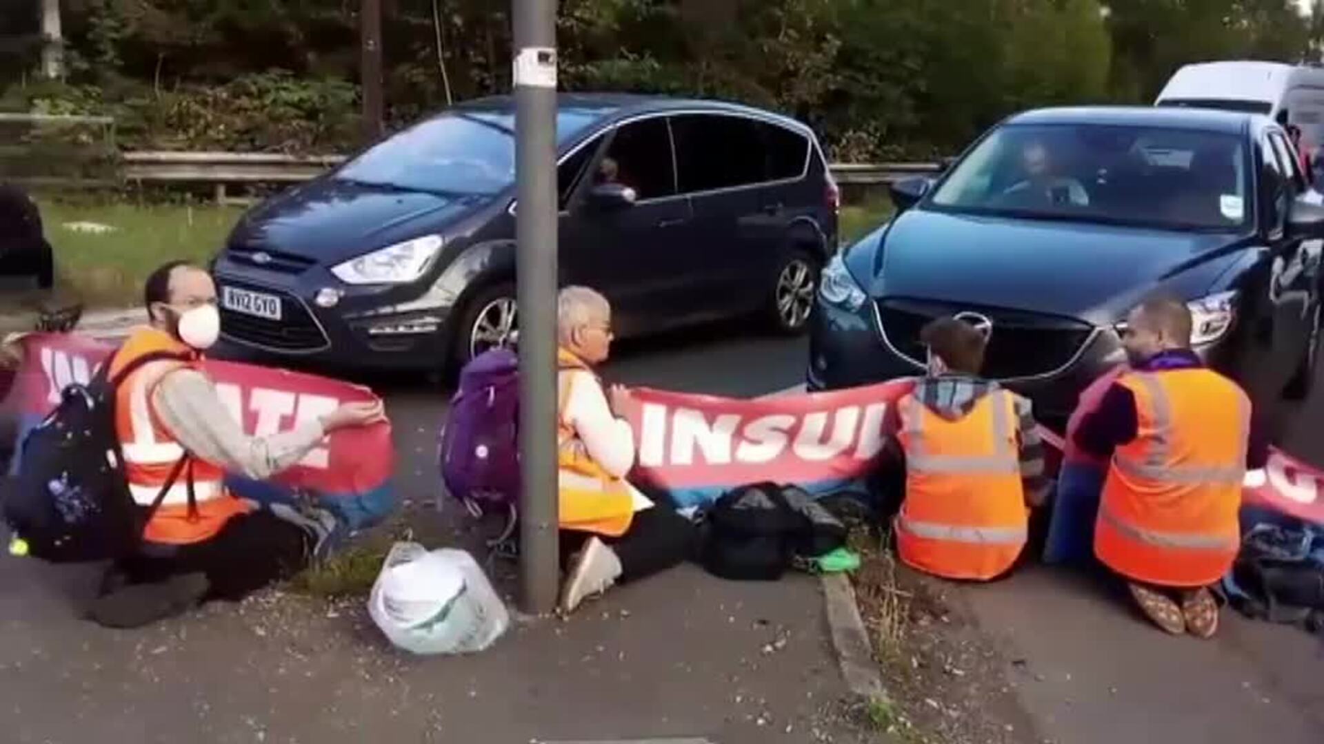Manifestantes climáticos cortan la autopista M25 de Londres por cuarta vez en una semana