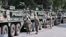 Soldados, tanques y otros equipos pesados ​​se preparan para el desfile militar de Washington