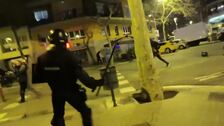 Los Mossos intervienen durante la octava noche de protestas por Hasel tras el lanzamiento de botellas