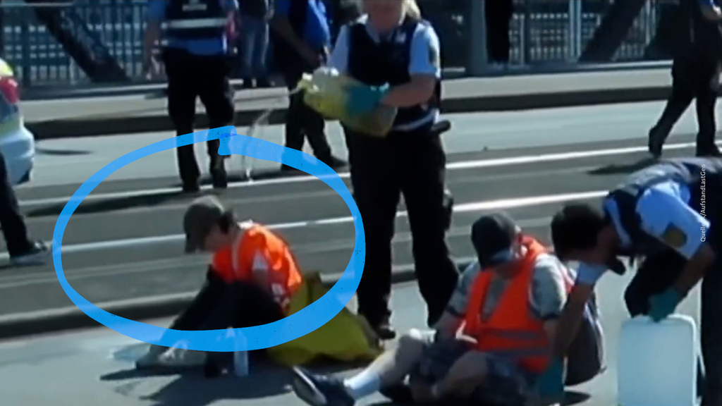 Vorfall wird geprüft: Polizistin kippt Öl über Klima-Aktivisten