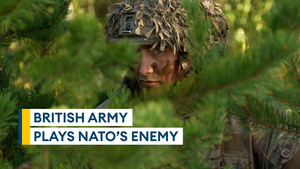 British Army plays role of enemy against Nato battlegroup during war games in Latvia