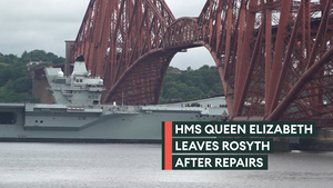 HMS Queen Elizabeth heads back to sea after repairs