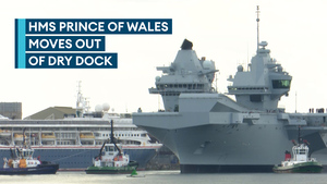 HMS Prince of Wales moves out of dry dock after nine months of repairs