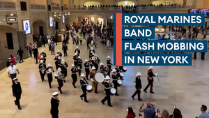 Royal Marines Band flash mob surprises New York rail passengers