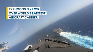 RAF Typhoons fly over world's largest aircraft carrier USS Gerald R Ford