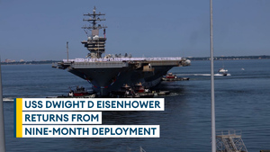 Carrier returns to emotional homecoming after battling Houthi attacks