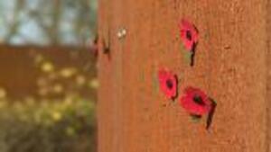 Children Lay Poppies At New International Bomber Command Centre 