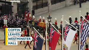 Royal Navy sailors pull Queen's coffin to Westminster Abbey for state funeral