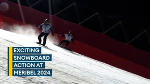 Snowboarders provide thrilling action in floodlit Parallel Giant Slalom races