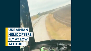 Amazing footage shows Ukrainian pilot's view as helicopters fly extremely low along highway