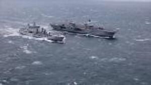HMS Queen Elizabeth Conducts At Sea Replenishment With RFA Tide Spring 