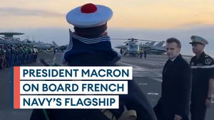 French president visits Charles de Gaulle carrier out at sea
