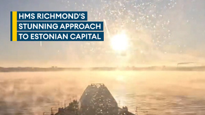 Stunning: HMS Richmond sails into the sun on approach to Estonian capital
