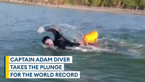 Former Army captain Adam Diver takes the plunge in a world record swim
