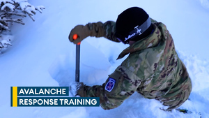 US soldiers learn how to locate buried avalanche victims