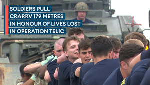 Soldiers pull tank recovery vehicle in honour of lives lost on Op Telic