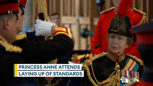 Prince Anne takes part in laying up of standards