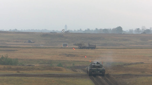 German Leopard 2 Tanks Train At Sennelager Ranges 