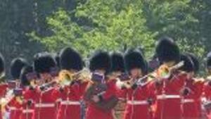 Thousands Watch Changing of the Guard At Buckingham Palace