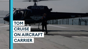 Tom Cruise arrives in style for 'Top Gun: Maverick' premiere on board aircraft carrier