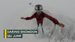 Former Royal Marine pulls off record-breaking ski base jump in Wales 