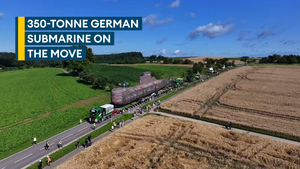 Cold War-era German submarine on the move - by road