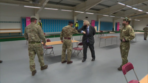 Boris Johnson Meets Troops Setting Up Vaccination Centre In Glasgow