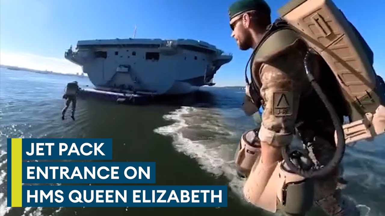 Real-life 'Iron Men' make jet suit entrance onto HMS Queen Elizabeth