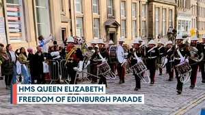 Crew of HMS Queen Elizabeth parade up the city's Royal Mile