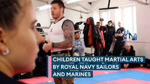 Personnel use martial arts to steer youths away from crime