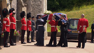 Military Personnel Carry Dame Vera Lynn's Coffin