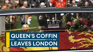 Queen's hearse leaves London after military-led procession and heads for Windsor Castle 