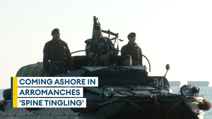 Marines make morning landing on Normandy beach