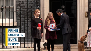 Prime Minister buys poppies outside No 10 Downing Street