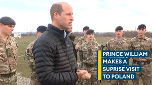 Prince William meets with British and Polish troops during surprise visit to Poland