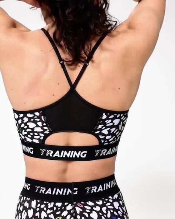 Women's Light Support Sports Bra with Thin Cross-Over Straps - Black & White - Video 2