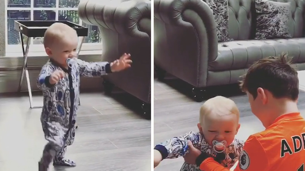 Roo sure about that shirt, Kai? Wayne Rooney's son wears Spurs Kit