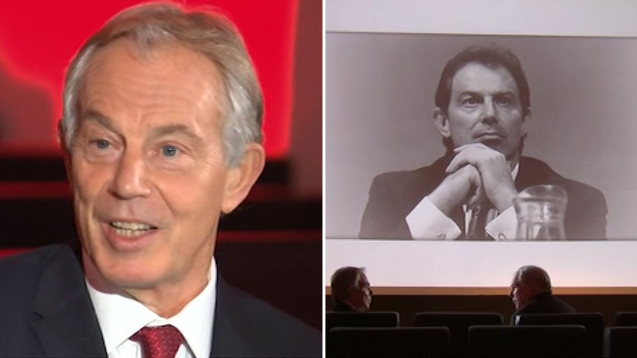 Tony Blair and wife Cherie confronted