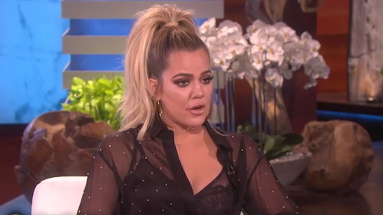 Khloe Kardashian strips off and flashes her boobs at sister's ex