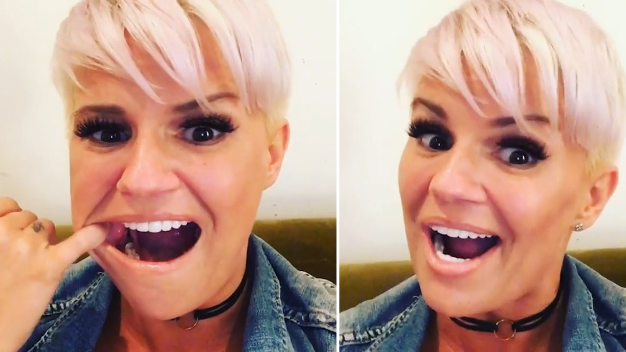 Kerry Katona laughs her head off as her boob pops out of her bikini after  she's pushed into the pool on holiday in Marbella with her kids