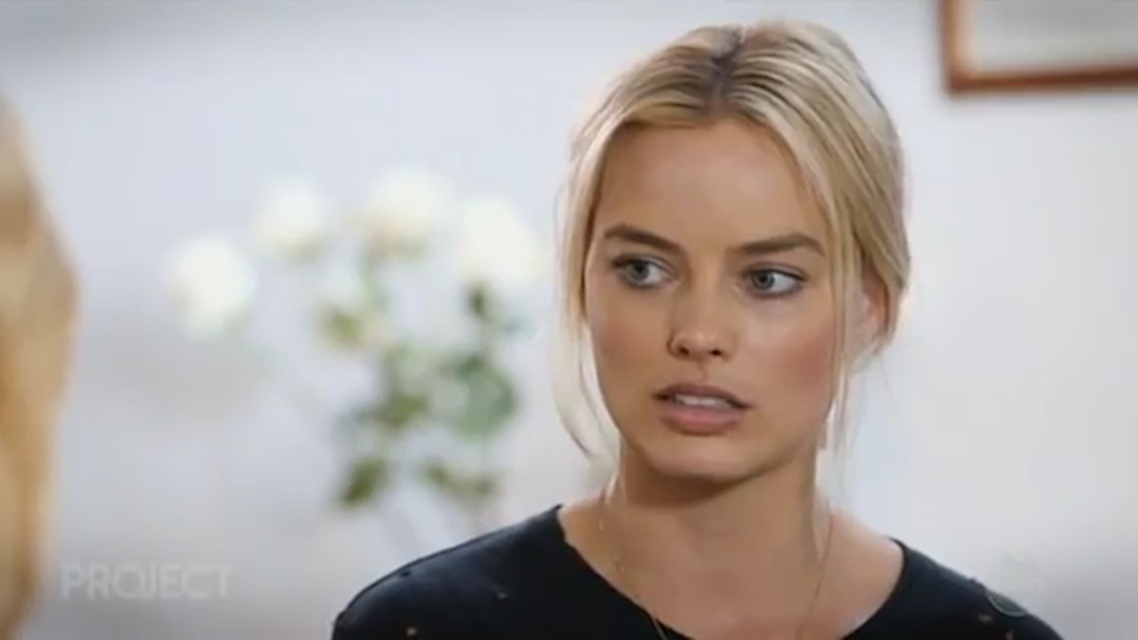 Margot Robbie makes a fashion fail wearing white bra under sheer black top  … yet stuns in sexy evening outfit – The Sun