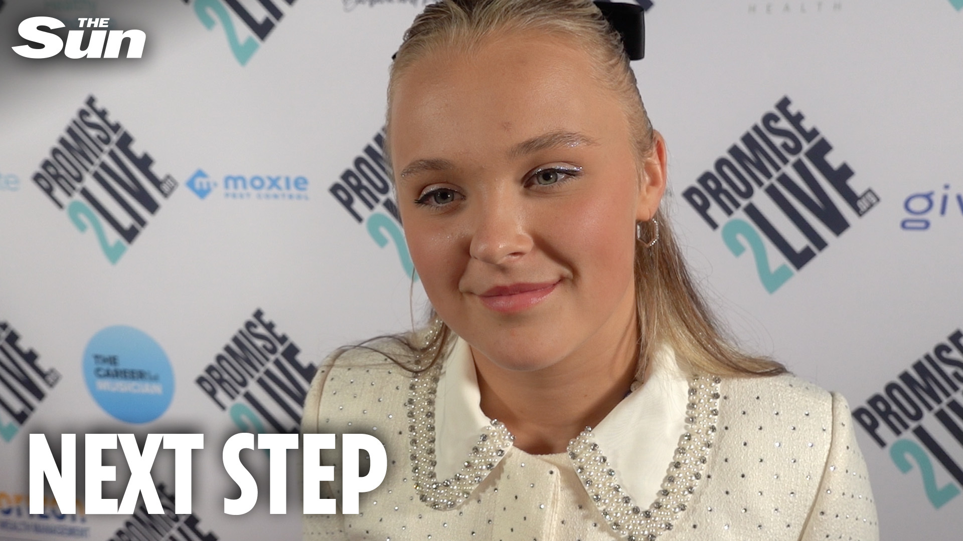 JoJo Siwa looks incredible in gold mini dress after hinting at MARRIAGE plans with Chris Hughes JoJo Siwa looks incredible in gold mini dress after hinting at MARRIAGE plans with Chris Hughes