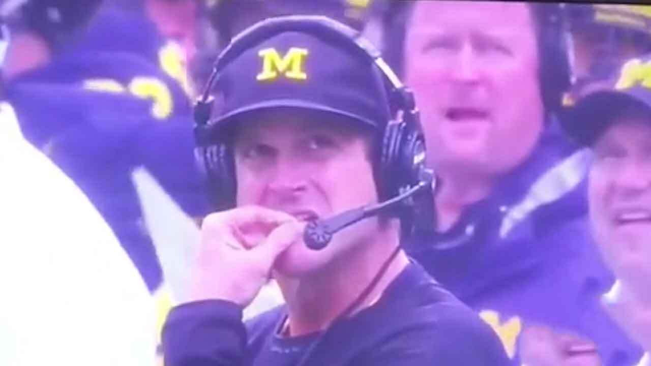 video american football coach jim harbaugh appear to eat his own snot then claim i have never eaten a booger in my entire life