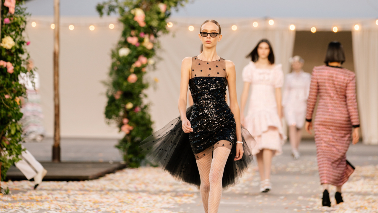 The CHANEL Spring-Summer 2021 Haute Couture Show, A little black organza  dress is swathed in sequin-embroidered polka dot tulle — the CHANEL  Spring-Summer 2021 Haute Couture collection filmed by Anton