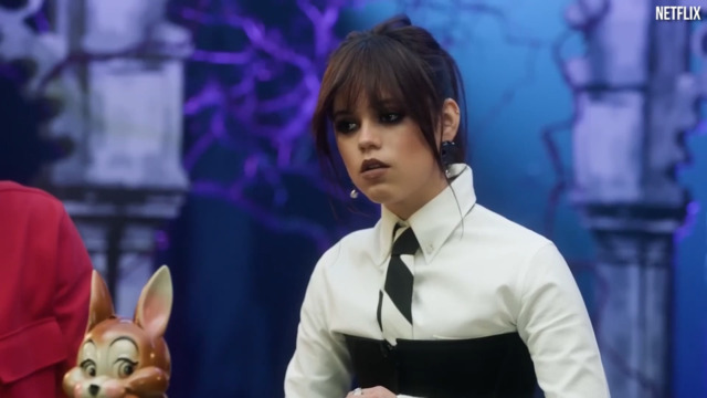 full body of a Wednesday Addams (Jenna Ortega) grinds the big axe in the  secret dark laboratory - Playground