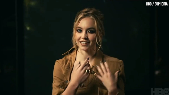 Sydney Sweeney's Naked Top Is a Literal Walking Work of Art